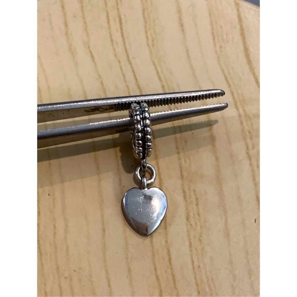 .925 Heart Dangling from Ornate Ring Sterling Silver Jewelry Charm #love